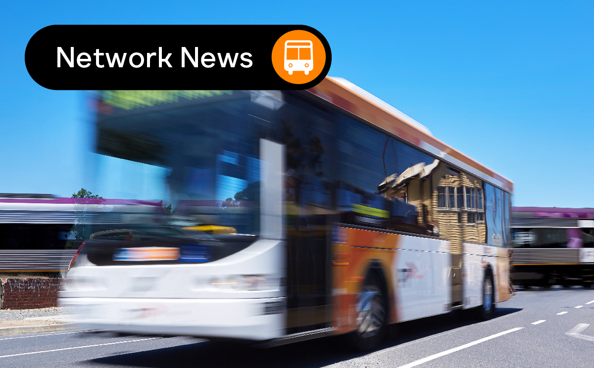 Network News and bus icon overlaying bus with zoom effect.