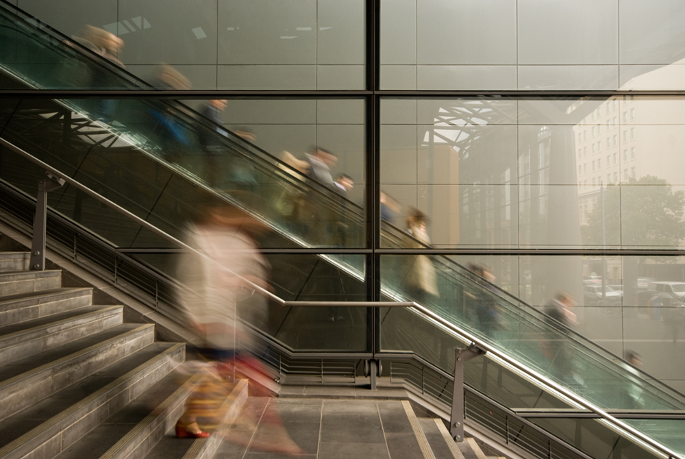 People on escalators and steps at Southern Cross Station Collins Street end