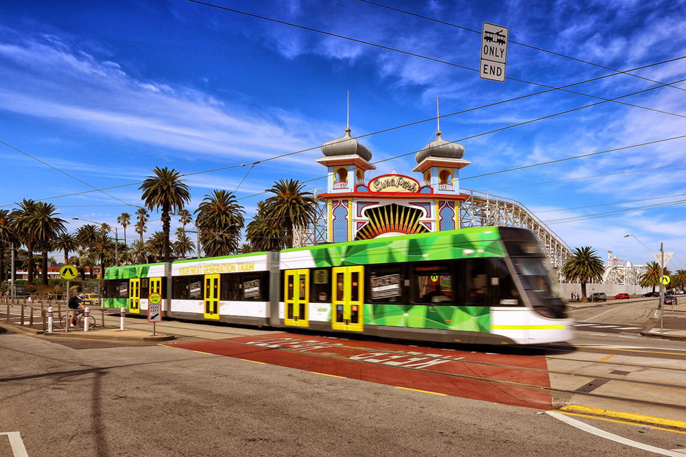 E-Class tram travelling past Luna Park in St Kilda